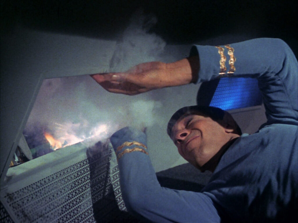 Spock attempts to fix the circuit.