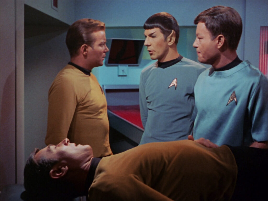 Kirk, Spock, McCoy and Stiles in the sickbay.
